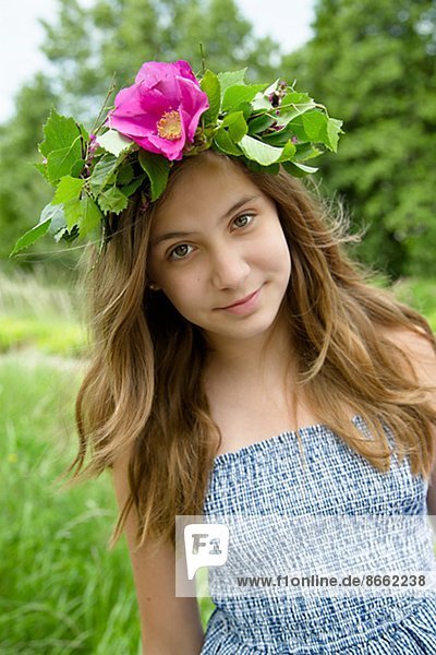 Portrait of girl wearing wreath of flowers  Nykoping  Sodermanland  Sweden