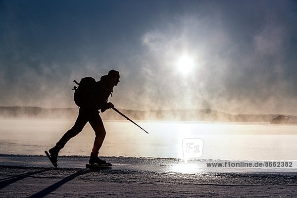Man long-distance skating  Skeppsbron  Sweden
