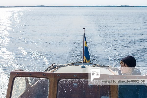 Woman on boat  Sweden