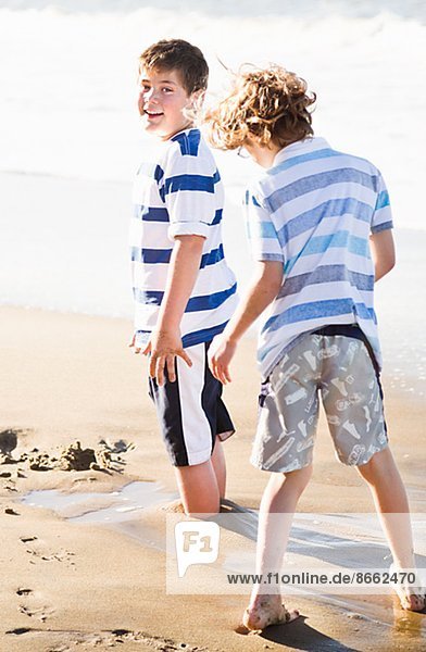 Boys playing on beach