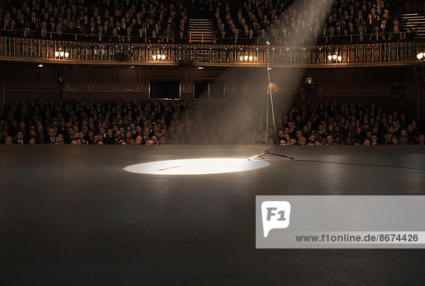 Spotlight shining on stage in theater
