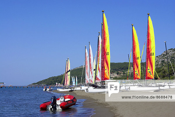 Catamarans and motorboat on the beach  Mediterranean Sea  Southwestern Turkey