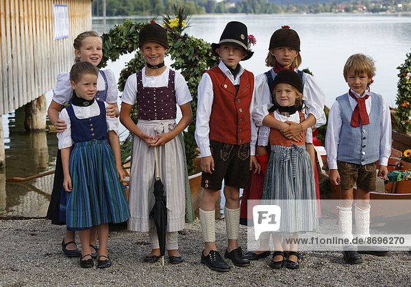 Children wearing traditional costumes  Alt-Schlierseer-Kirchtag festival  Schliersee  Upper Bavaria  Bavaria  Germany