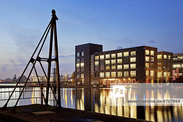 Innenhafen Inner Harbour at dusk Duisburg Ruhr Area North Rhine-Westphalia Germany