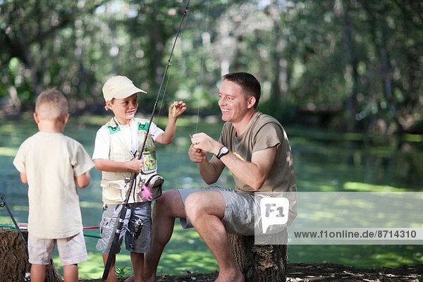 Father and sons on fishing trip