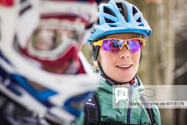 Close up of two female mountain bikers