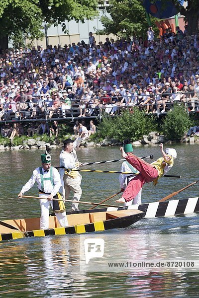 Historical characters on a boat during the contest on the Danube River  Fischerstechen  Ulm  Baden Wurttemberg  Germany  Europe