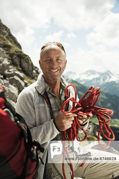 Portrait of Man Hiking in Mountains  Tannheimer Tal  Tyrol  Austria