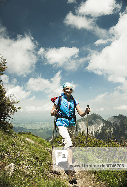 Mature woman hiking in mountains  Tannheim Valley  Austria