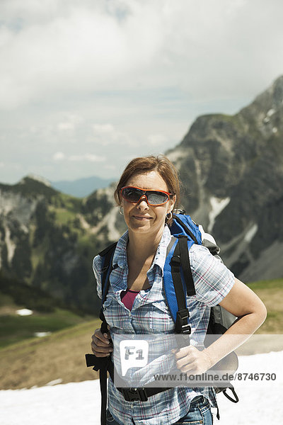 Portrait of mature woman hiking in mountains  Tannheim Valley  Austria