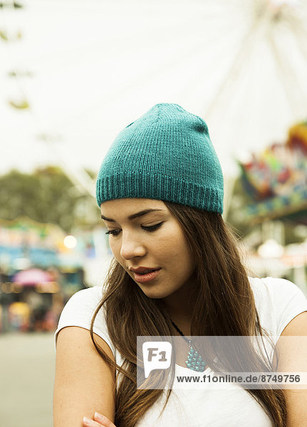 Close-up portrait of teenage girl at amusement park  Germany