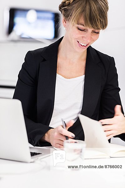 Young woman working in office  Stockholm  Sweden