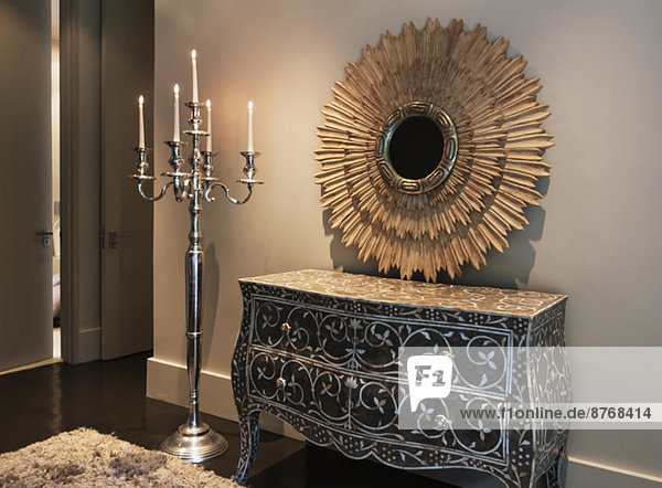 Elegant dresser  mirror and candelabra in luxury bedroom