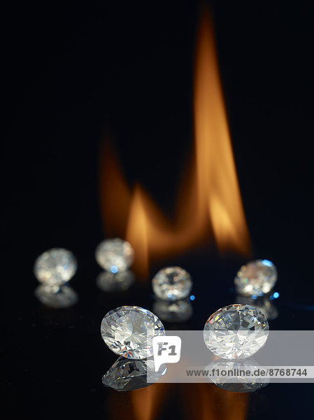 Diamonds in front of a flame