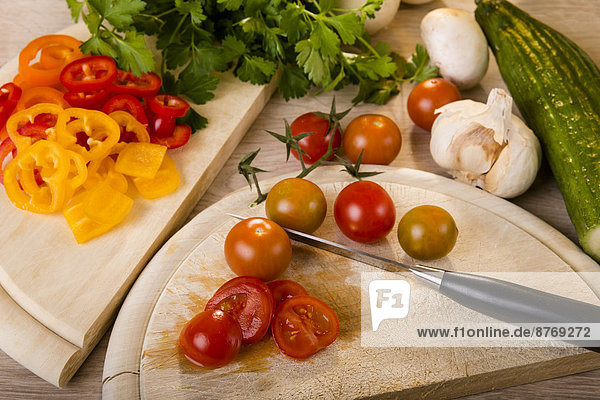 Chopped tomato on chopping board