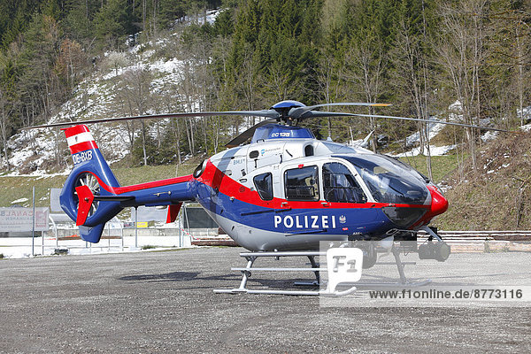 Police helicopter with a thermal imaging camera for the search of hot spots after a forest fire  Tyrol  Austria