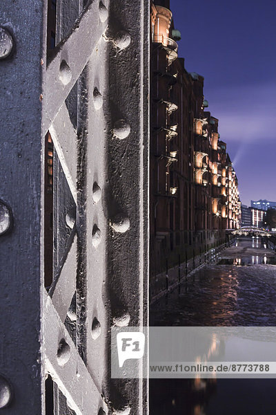 Germany  Hamburg  Illuminated Pillar of a girder bridge in the historic warehouse district
