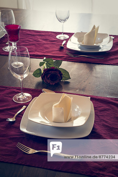 Place setting on festive laid table