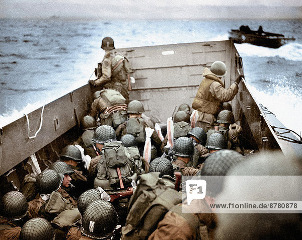 WW II  historical  war  world war  second world war  operation Overlord  Overlord  invasion  troops  landing craft  boat  LCVP  Omaha Beach  June  1944  soldiers  military  weapons  arms  Saint Laurent sur Mer  allies  Allied Forces  Normandy  France  Europe  D-Day