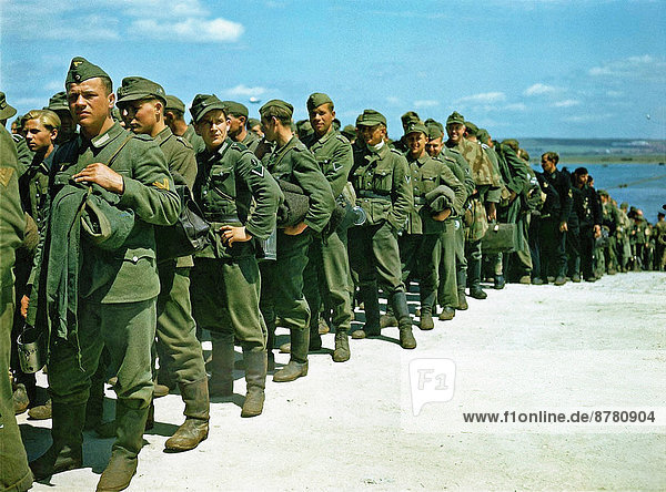 WW II  historical  war  world war  second world war  operation Overlord  Overlord  invasion  German  prisoners  Nazi  National Socialist  soldier  march  Gosport  June  1944  Nazi  National Socialist  Hampshire  United Kingdom  Great Britain