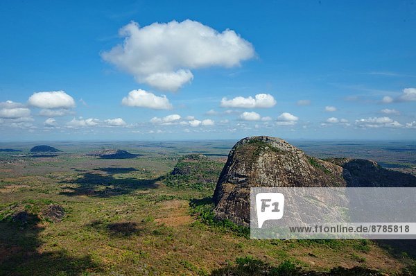 Africa  Mozambique  Quirimbas national Park  inselberg rock formation emerging from savanna in Meluco area                                                                                              