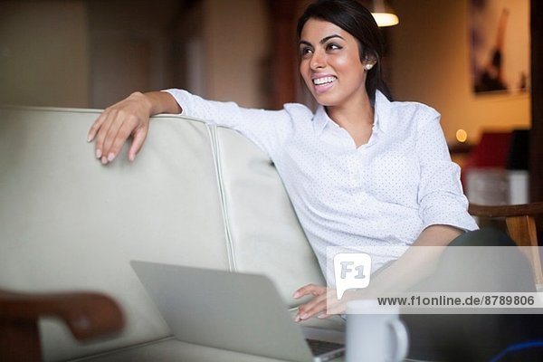 Young woman using laptop computer