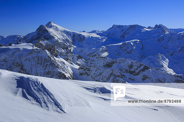 Alps  view  mountain  mountain panorama  mountains  Bernese Alps  mountains  Gwächtenhorn  sky  massif  fog patches  panorama  snow  Switzerland  Europe  Swiss Alps  Sustenhorn  animal mountains  winters  clouds  alpine  blue  blue sky  Swiss  sunny  snow-covered  snowy