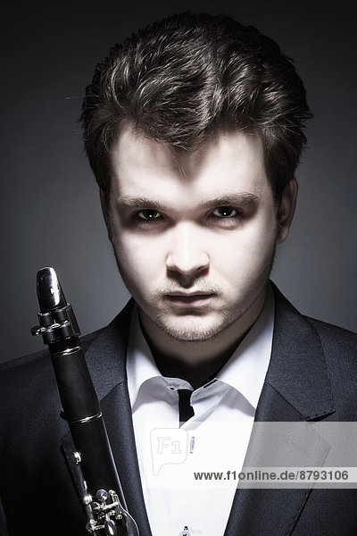 Portrait of Young Male Musician With Clarinet