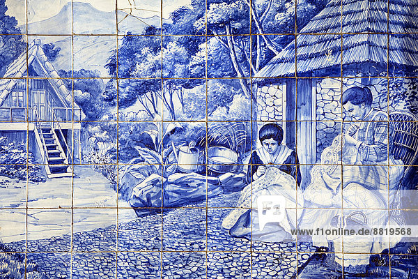 Azulejo  painted tiles  two women doing embroidery work  Madeira  Portugal