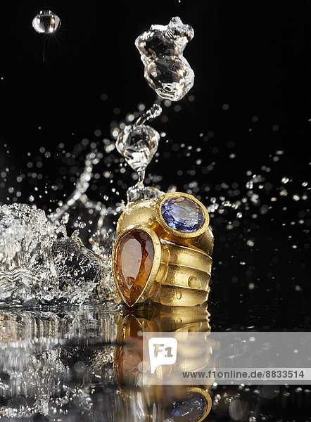 Golden ring with tanzanite and citrine  water splashing around