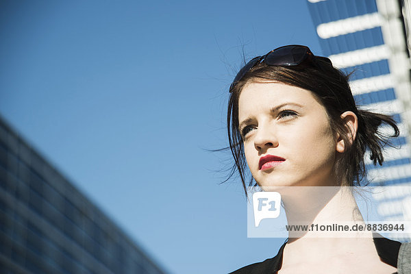 Portrait of young business woman waiting