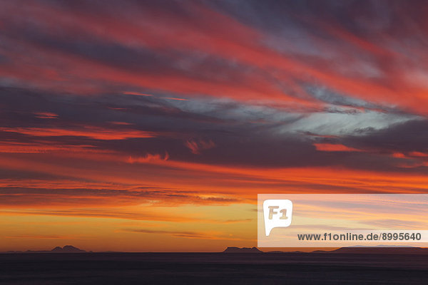 Felsbrocken Wolke Sonnenuntergang Beleuchtung Licht Küste Andalusien Gibraltar links Mittelmeer rechts Spanien Meerenge
