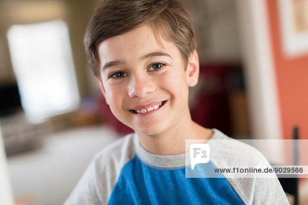 Portrait of smiling boy at home