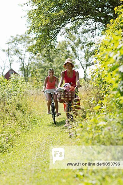 Mature woman with teenage girl cycling  Oland  Sweden
