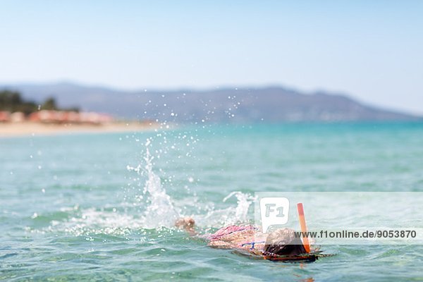 Girl swimming in sea  Naxos  Greece