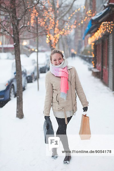 Young woman on street at winter  Manhattan  New York City  USA