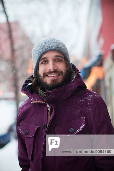 Young man on street at winter  Manhattan  New York City  USA