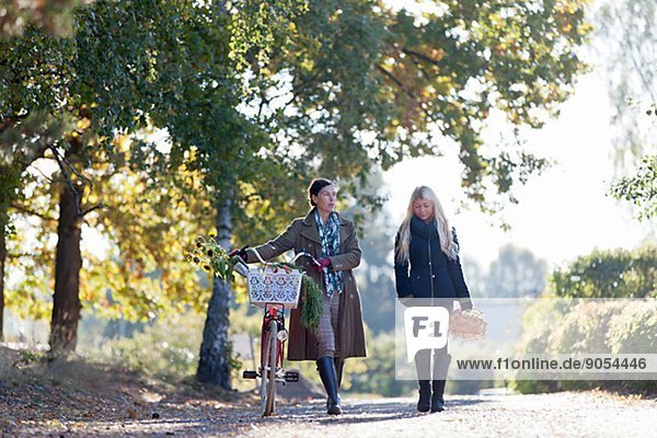 Mature woman and adult daughter walking  Stockholm  Sweden