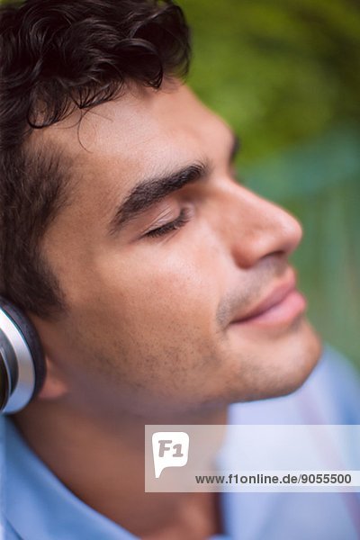 Young man with headphones  Bangkok  Thailand