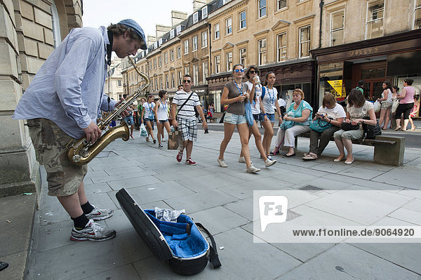 Street musician playing the saxophone  Bath  Somerset  South England  England  United Kingdom