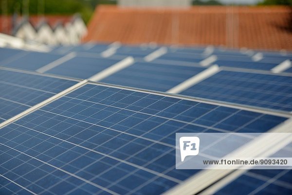 Solar panels of a solar energy plant are seen on a roof of a house in Osterode (central Germany) on 15 August 2013.