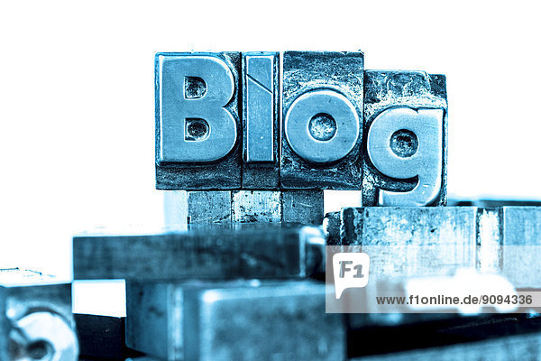 Old metal types forming the word blog