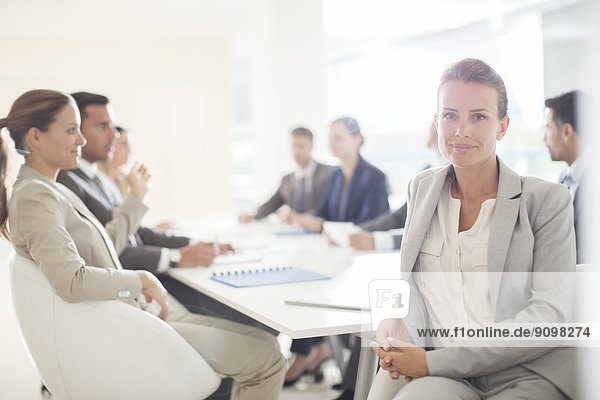 Portrait of confident businesswoman in conference room