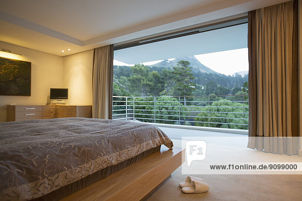 Luxury bedroom with mountain view