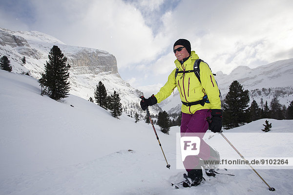 Snowshoer in the Fanes range  San Vigilio  South Tyrol  Italy