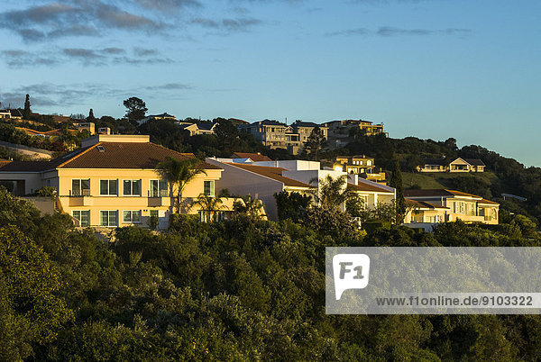 Houses in the morning light settlement Plettenberg Bay or Plettenbergbaai Garden Route Eden District Western Cape South Africa
