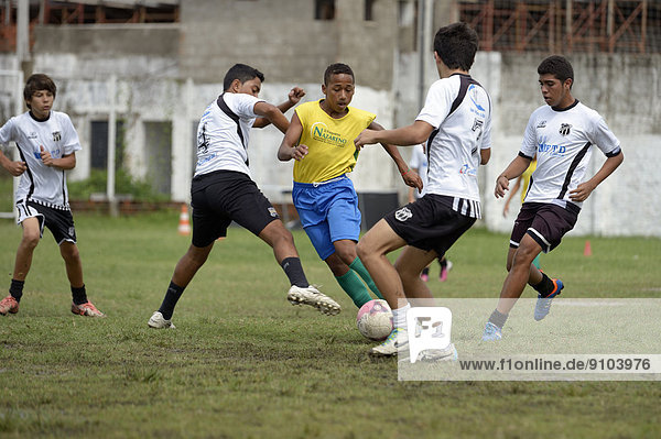 Street children playing a friendly soccer match against a youth team  preparation for the Street Children World Cup 2014  Fortaleza  Ceará  Brazil