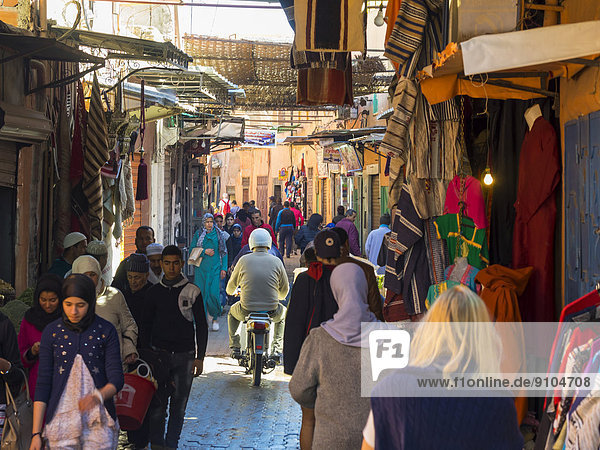Passers-by in the narrow Derb Dabachi lane  Medina  Marrakech  Marrakech-Tensift-Al Haouz  Morocco