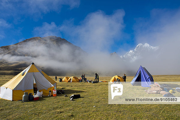 Clouds  morning mist at a hikers' tent camp  Cordillera Huayhuash mountain range  Northern Peru  Peru