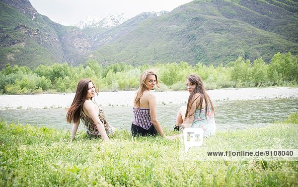 Portrait of three female friends next to Toce river  Piemonte  Italy